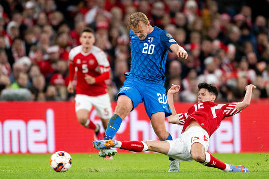 Joel Pohjanpalo of Finland and Christian Nørgaard of Denmark