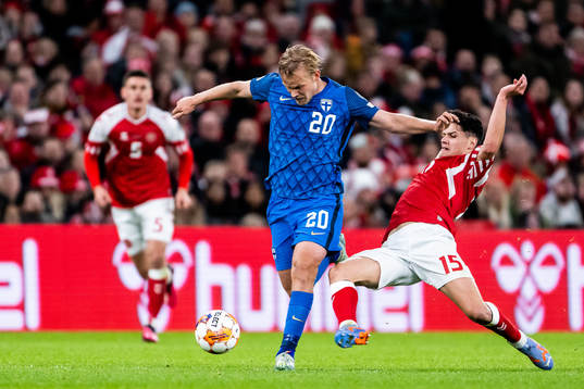 Joel Pohjanpalo of Finland and Christian Nørgaard of
