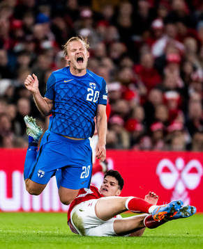 Joel Pohjanpalo of Finland and Christian Nørgaard of Denmark