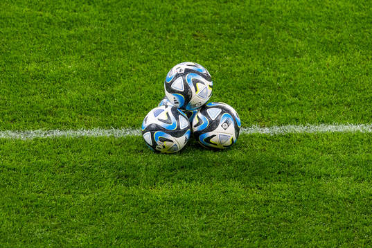 Footballs on the pitch ahead of the UEFA Euro Qualifier football match between Sweden and Belgium on March 24, 2023 in Stockholm. 