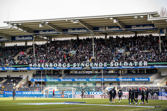 Spectators in the stands at Lerkendal Stadion ahead of the Eliteserien match between Rosenborg and Viking on April 10, 2023 in Trondheim.