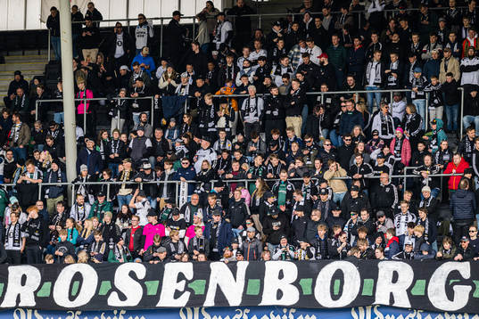 Spectators in the stands at Lerkendal Stadion ahead of the Eliteserien match between Rosenborg and Viking on April 10, 2023 in Trondheim.