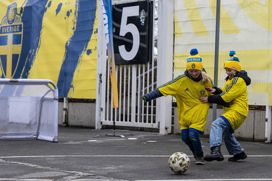 Kids playing football in fan zone