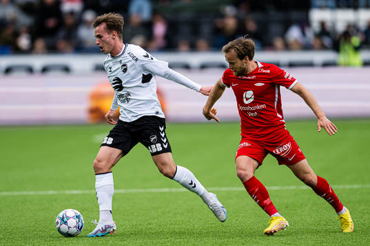 Conrad Wallem of Odd and Bård Finne of Brann