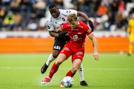 Solomon Owusu of Odd and Ole Didrik Blomberg of Brann