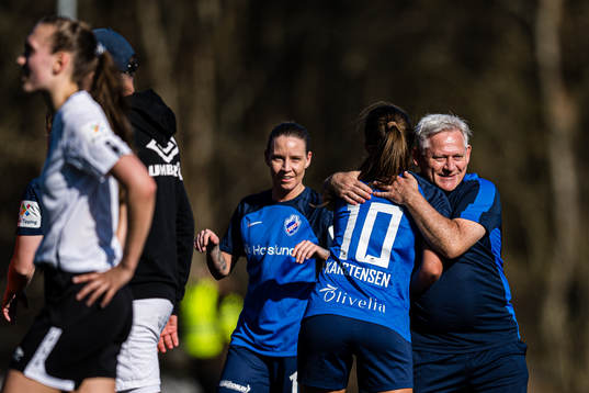Tine Celine England Karstensen of Grei and Jan Aksel Odden, head coach of Grei, celebrates