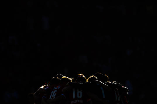 Players of Brann gather in a circle ahead of the Eliteserien football match between Brann and Vålerenga on April 22, 2023 in Bergen. 