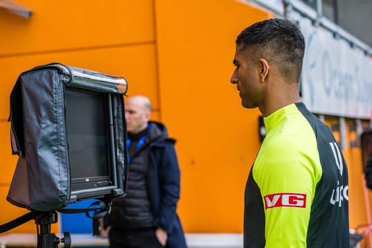 Mohammad Usman Aslam, referee, checking the VAR screen