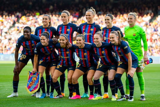 The starting eleven of Barcelona pose for a team photo