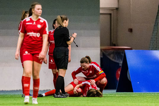 Marthe Hansen of Grand Bodø in pain