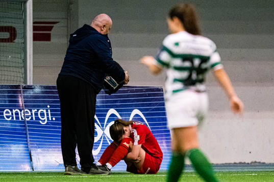 Marthe Hansen of Grand Bodø in pain