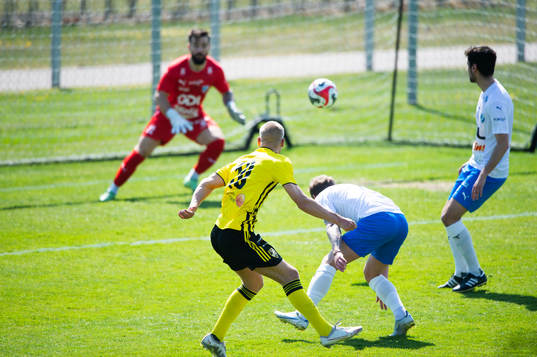 IFK Hässleholms Olle Kjellman Olblad gör 1-0 i matchen i division 2 mellan IFK Hässleholm och IFK Berga i Hässleholm 13 maj 2023.