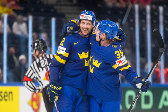 Patrik Nemeth and Rasmus Sandin of Sweden celebrate