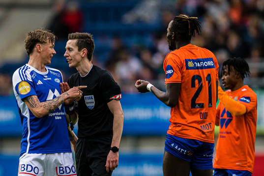 Birk Risa of Molde, Sivert Øksnes Amland, referee, and