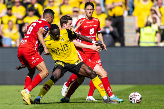 Japhet Sery Larsen and Mathias Rasmussen of Brann and Akor Adams of Lillestrøm