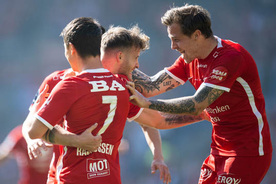 Ole Didrik Blomberg, Mathias Rasmussen and Frederik Lindbøg Børsting of Brann celebrate scoring 1-0 