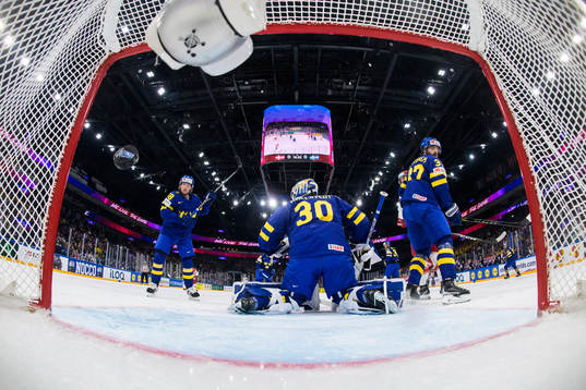 Goaltender Jesper Wallstedt of Sweden lets in the 1-0 goal