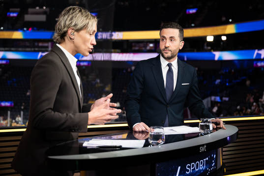 Presenters for Swedish television Maria Rooth and Johan