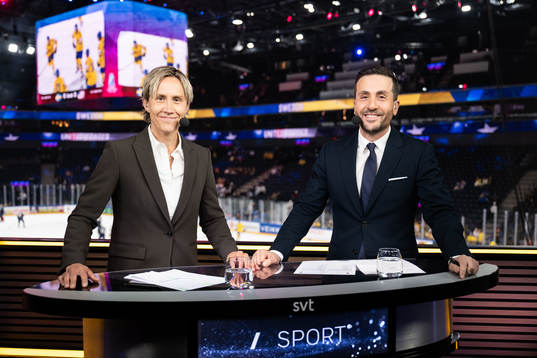 Presenters for Swedish television Maria Rooth and Johan