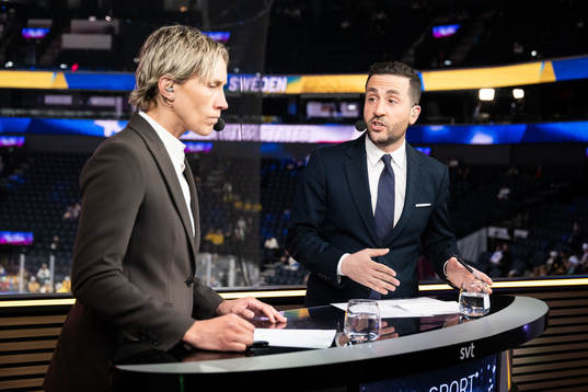 Presenters for Swedish television Maria Rooth and Johan