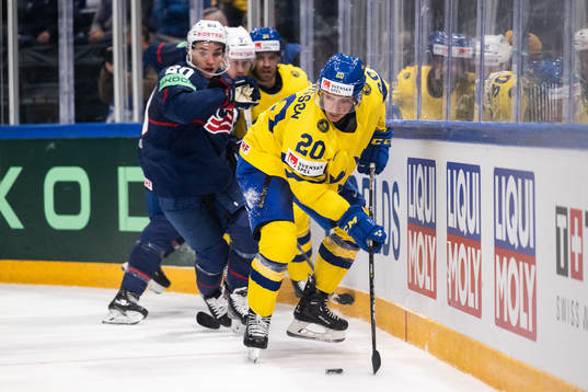 Lane Hutson of USA and Christian Folin of Sweden