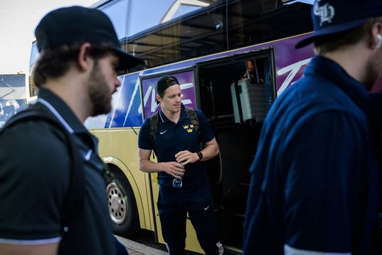 Goaltender Lars Johansson of Sweden leaves a bus when