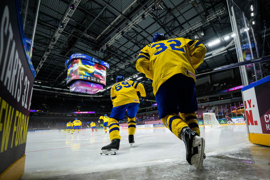 Linus Johansson and Lukas Bengtsson of Sweden enter the ice