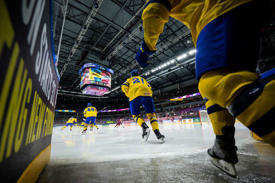 Leo Carlsson of Sweden enters the ice for warm-up