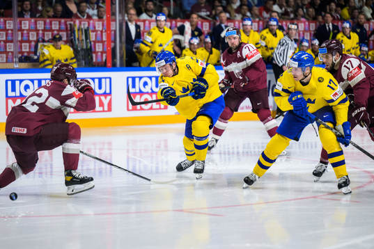 Janis Jaks and Martins Dzierkals of Latvia with Lucas