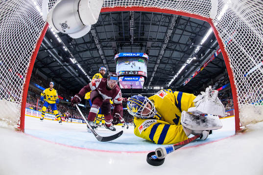 Oskars Batna of Latvia sees the 1-3 goal by Janis Jaks go