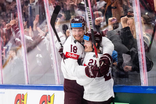 Rudolfs Balcers and Rodrigo Abols of Latvia celebrate