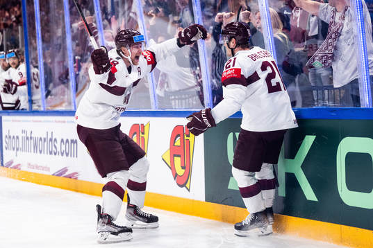 Rodrigo Abols and Rudolfs Balcers of Latvia celebrates