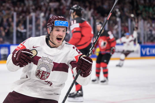 Rudolfs Balcers of Latvia celebrates scoring the 1-2 goal