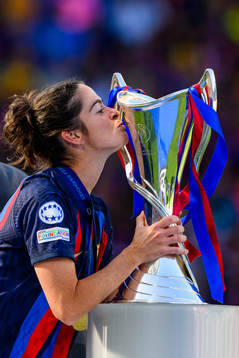 Marta Torrejon Moya of Barcelona kisses the trophy