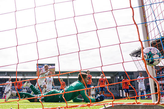 Sivert Heltne Nilsen of Brann scores the 1-1 goal on a penalty kick behind Sten Michael Grytebust of Aalesund