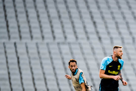 Hakan Calhanoglu and Milan Skriniar of Inter at a training session ahead of the UEFA Champions League final on June 9, 2023 in Istanbul. 