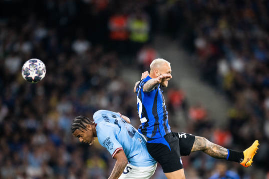 Manuel Akanji of Manchester City and Federico Dimarco of