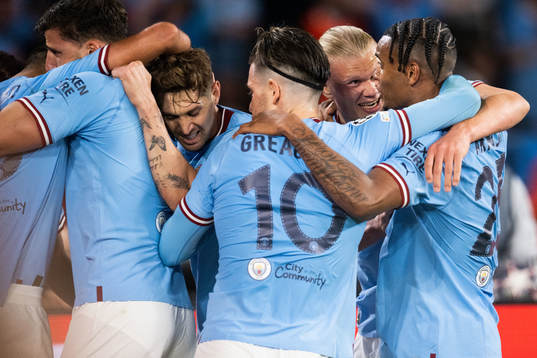 Rodri of Manchester City celebrates with team mates
