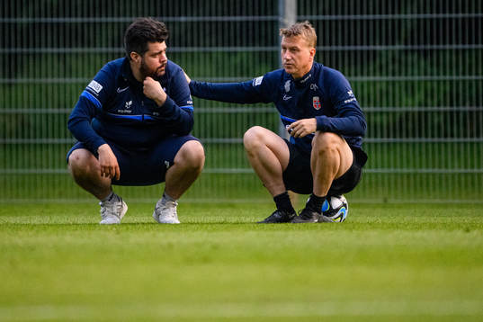 Analytics Eirik Kolstad and head coach Leif Gunnar Smerud of the Norwegian Under-21 national football team at a training session