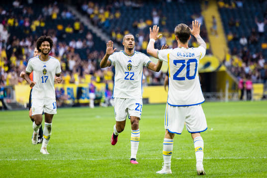 Robin Quaison of Sweden celebrate with teammates