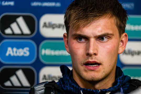 Mads Hedenstad Christiansen of Norway in the mixed zone