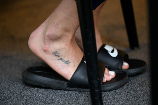 Nathalie Björn with a tattoo with the text 