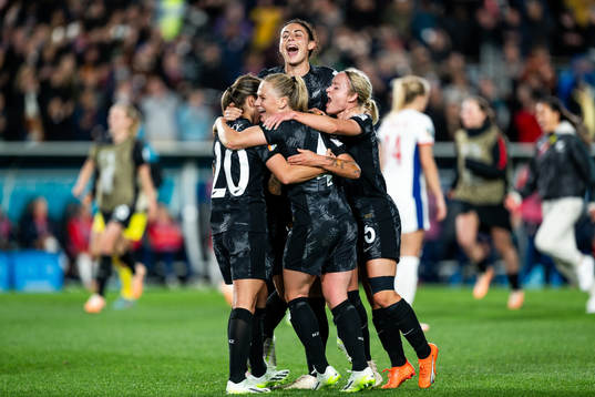 Indiah-Paige Riley, CJ Bott, Michaela Foster and Claudia Bunge of New Zealand celebrate