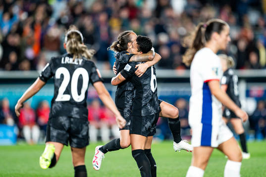 Ria Percival and Malia Steinmetz of New Zealand celebrate