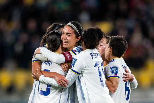 Hali Long of Philippines celebrates with team mates