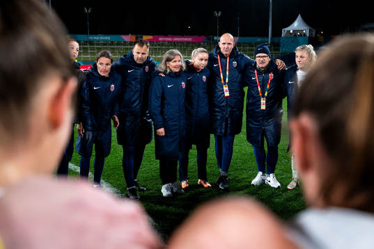 Assistant coach Ingvild Stensland, goalkeeper coach Jon Knudsen, head coach Hege Riise, Anna Langås Jøsendal, performance psychology consultant Morten Åsli and press officer Halvor Lea of Norway after the FIFA Women's World Cup football match between Switzerland and Norway on July 25, 2023 in Hamilton. 
