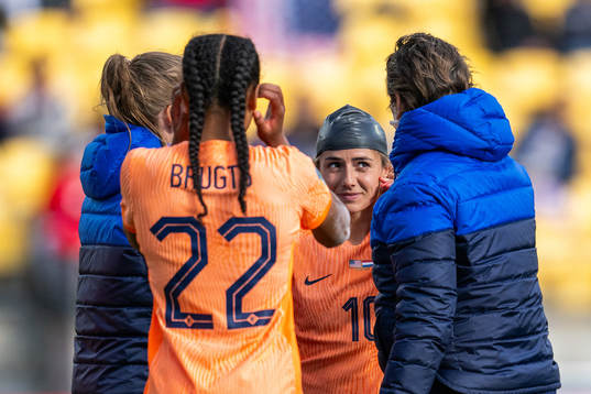 Danielle van de Donk of Netherlands with a rubber cap after receiving medical attention