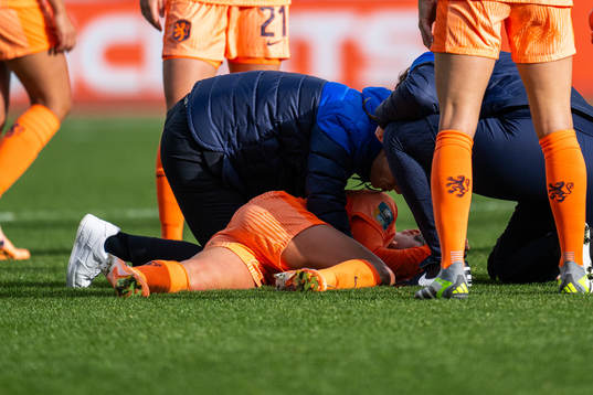 Danielle van de Donk of Netherlands receives medical attention