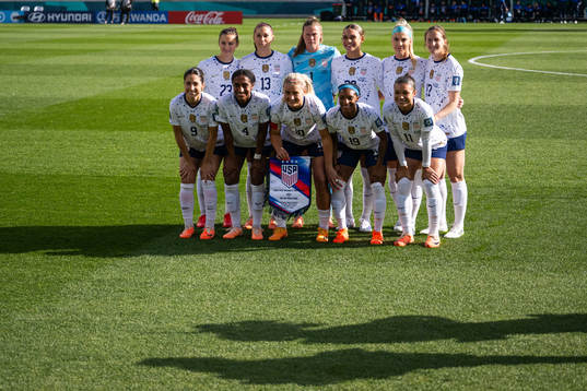 The starting eleven of USA pose for a picture