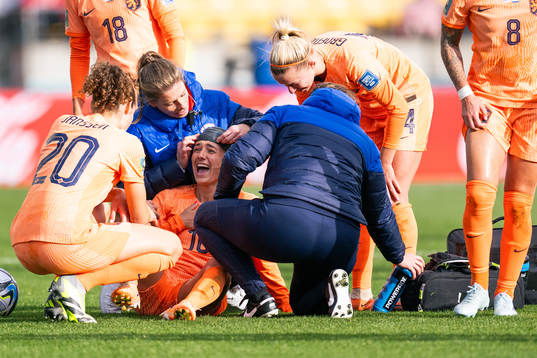Danielle van de Donk of Netherlands receives medical attention